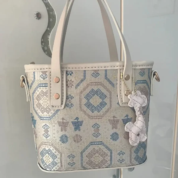 Elegant Handcrafted Handbags in Silver-Blue Python Pattern Fabrics Design - Image 7